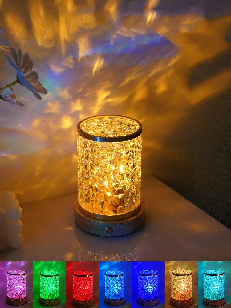 Rotating water ripple night light with acrylic body and solid wood base measuring 9.5cm wide
