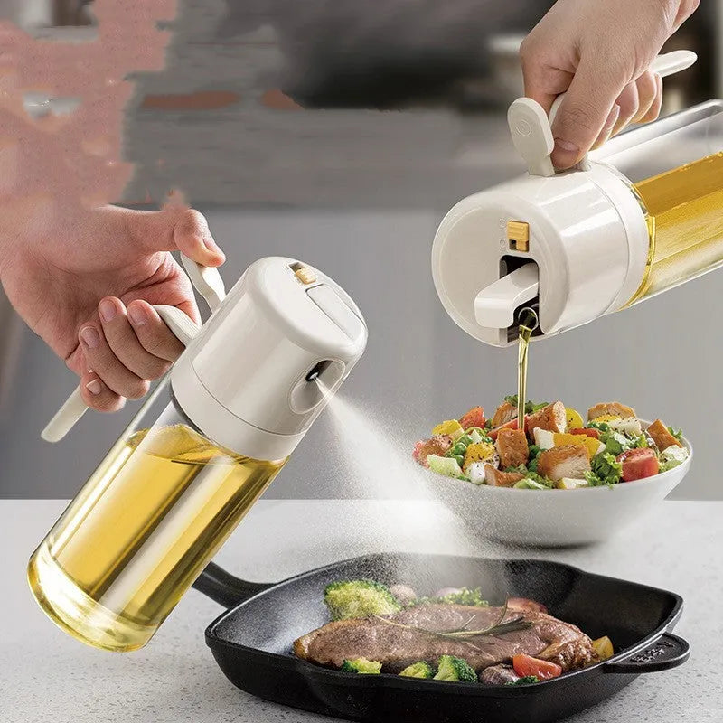 Warm grey glass 2-in-1 oil sprayer and pourer bottle with switchable cap on kitchen counter