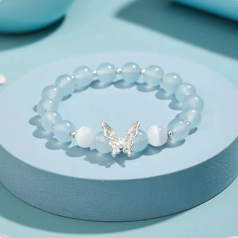 Women's crystal butterfly bracelet with cat eye design in bow shape showing three colour options