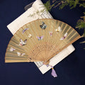 Traditional bamboo folding fan with Su embroidery showing butterfly pattern, 7 inches when open