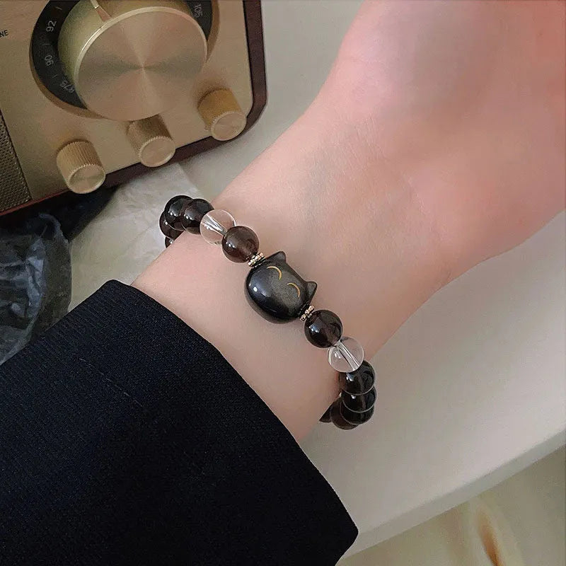 Women's silver stone bracelet with detailed opal cat head charm and 8mm setting