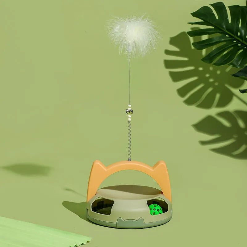 Bite-resistant cat toy with a coloured spinning ball on a flexible plastic wand.