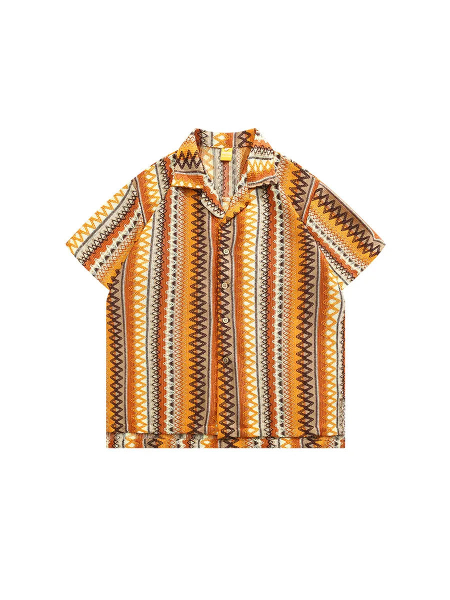 Loose fit ethnic style woven Cuban collar shirt in contrasting colours on a hanger.