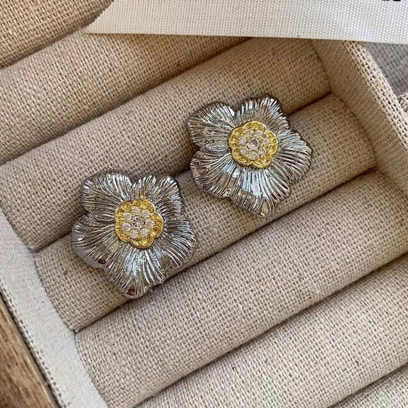 Retro gardenia stud earrings with textured floral design and two-tone electroplated finish