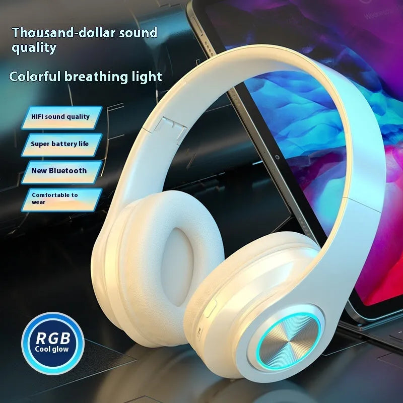 Black wireless Bluetooth over-ear gaming headset with microphone on a stand.