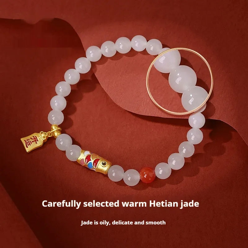 S925 sterling silver bracelet with natural Hetian jade and lucky koi cold enamel design, 6mm wide.