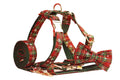 Green snowflake patterned cloth dog collar set with matching vest, leash, and bow for Christmas