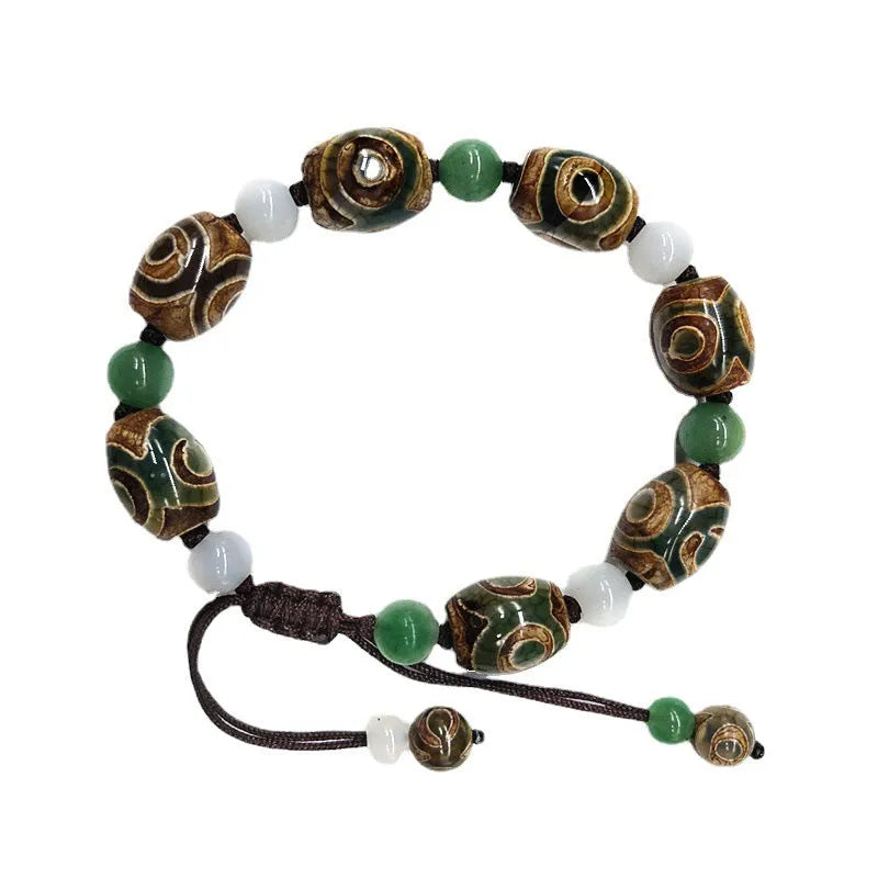 Green agate ethnic bracelet with geometric three-eye beads and adjustable closure