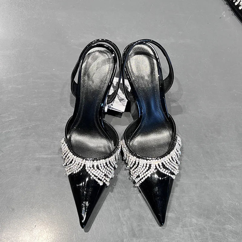 Black French tassel rhinestone slingback high heel sandals with a 10cm heel and pointed toe.
