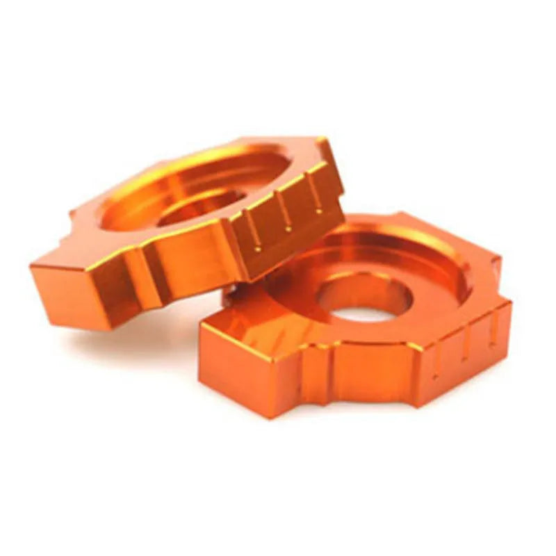 Pair of orange metal screw regulators for KTM DUKE motorcycle rear fork modification