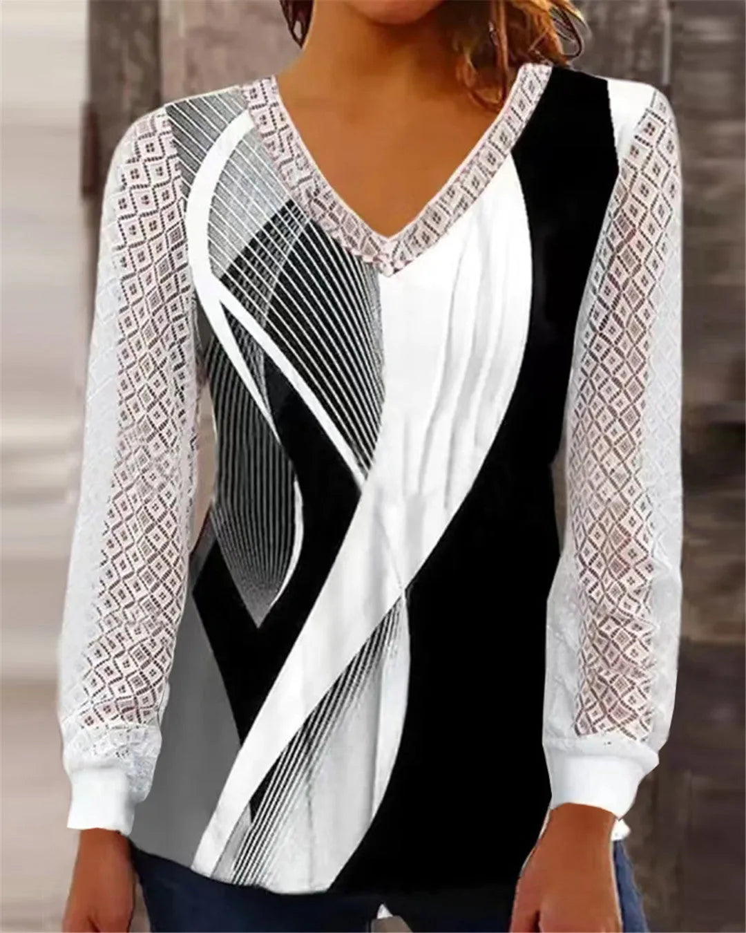 Purple V-neck loose pullover top with hollow-out lace print detailing and long sleeves