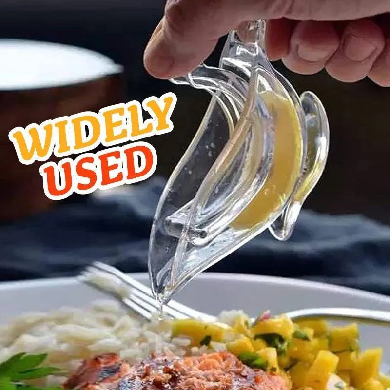 Transparent acrylic bird-shaped manual lemon juicer on a kitchen counter