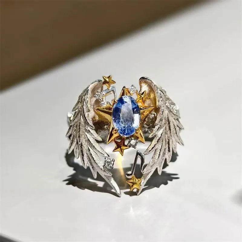 Adjustable geometric angel wings ring with open mouth design in alloy metal