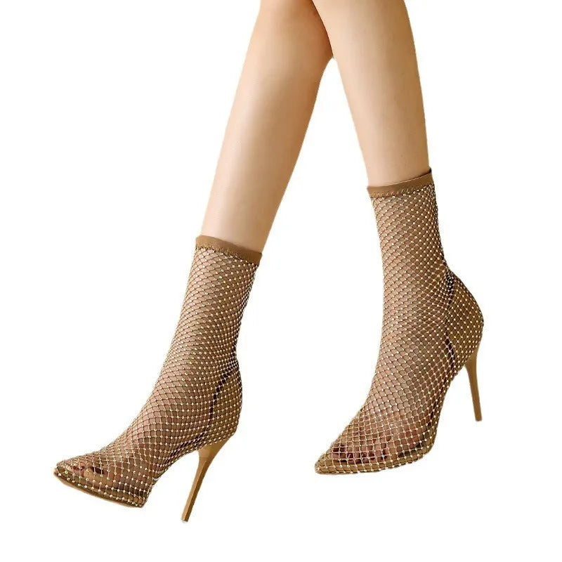 Gold mesh high heel sandals with pointed toe and stiletto heel on rubber sole