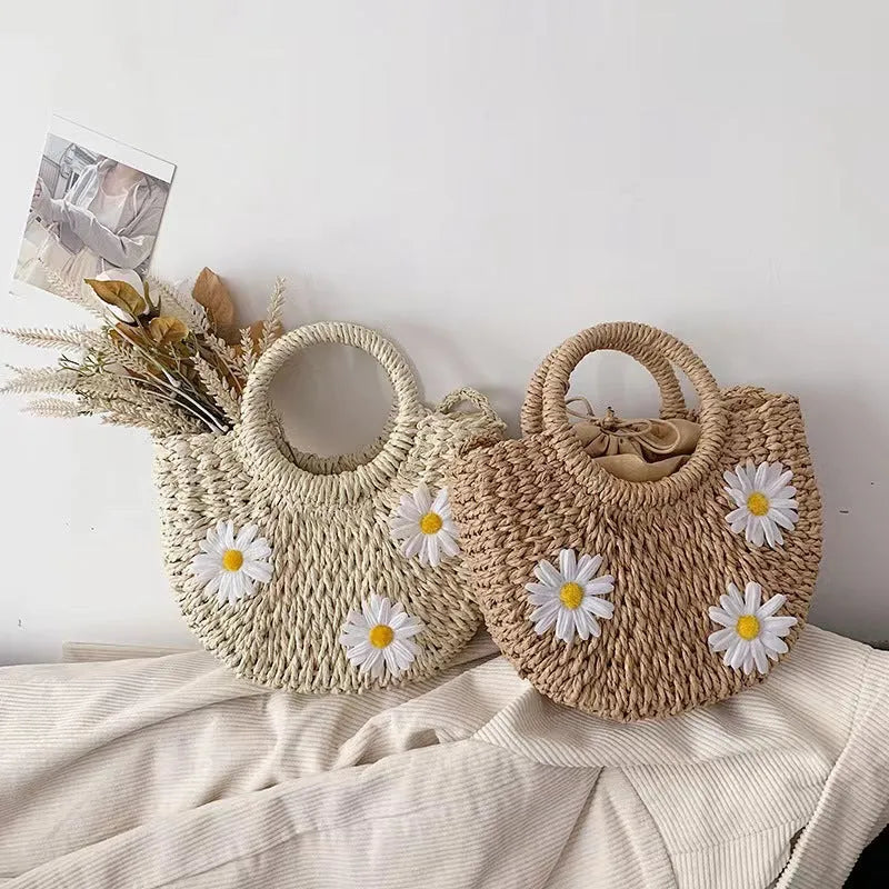 Women's light brown straw-weaved crossbody bag with daisy decoration, 25cm wide