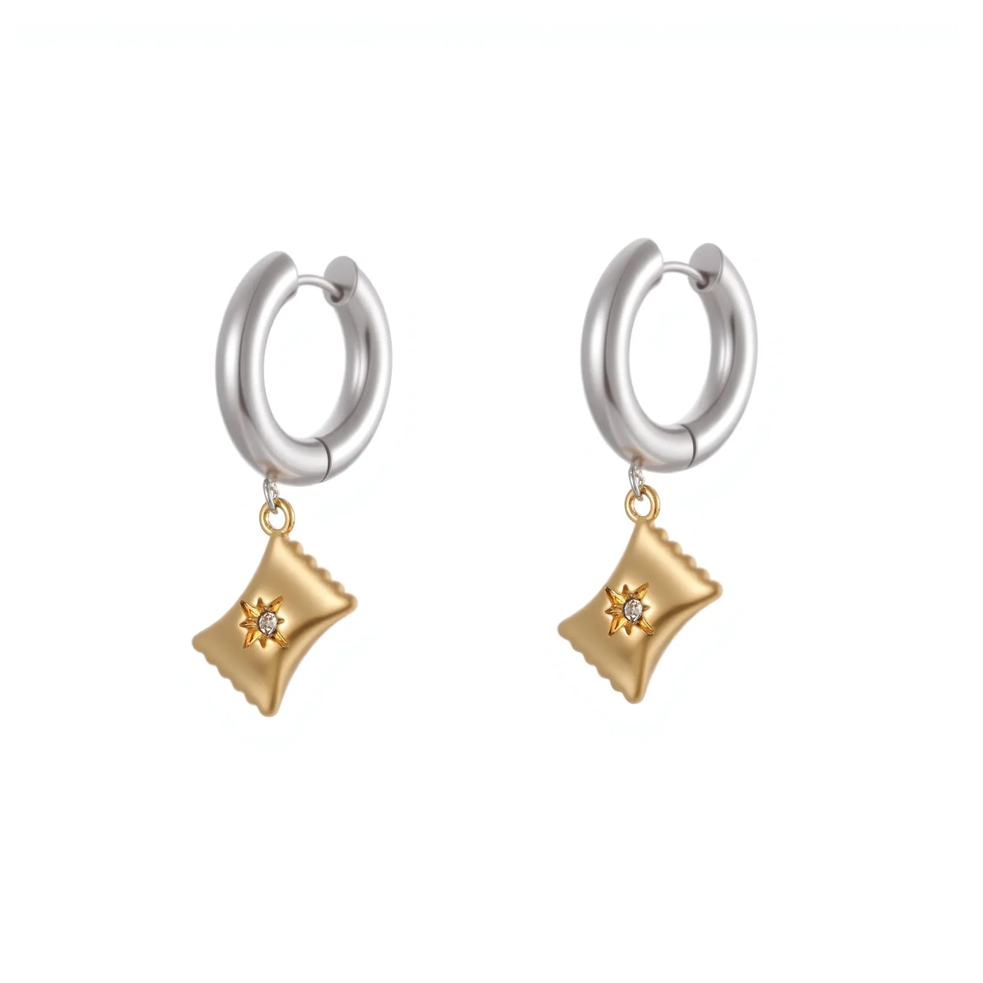 A pair of stainless steel Christmas tree and heart shaped earrings with 18K gold electroplating.