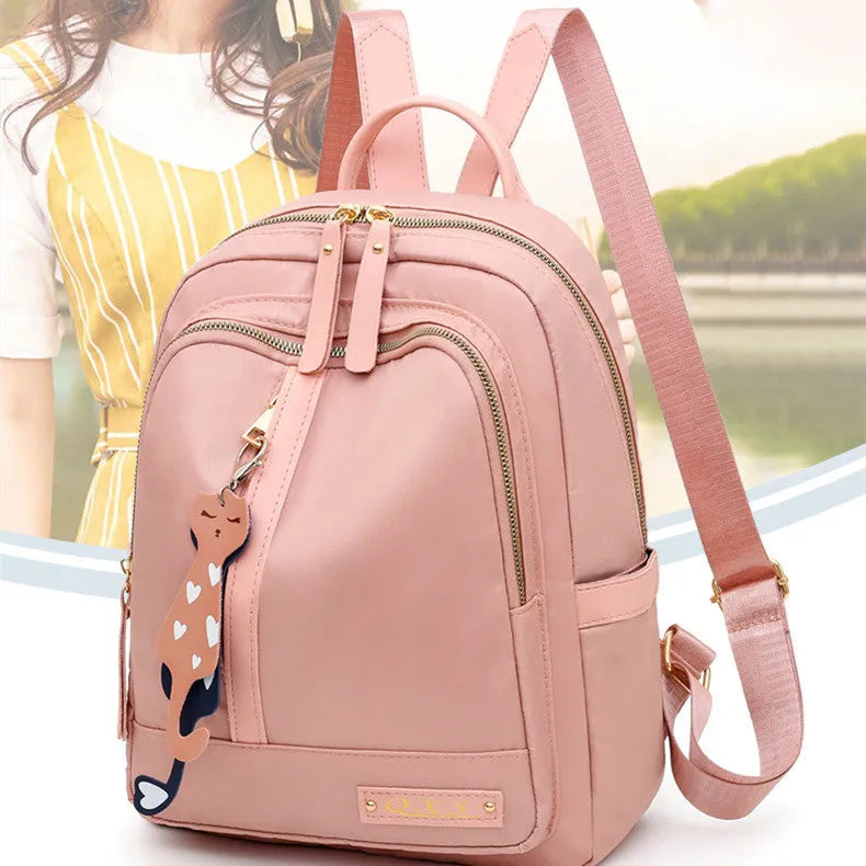 Black casual backpack with double straps and multiple compartments, 20L capacity
