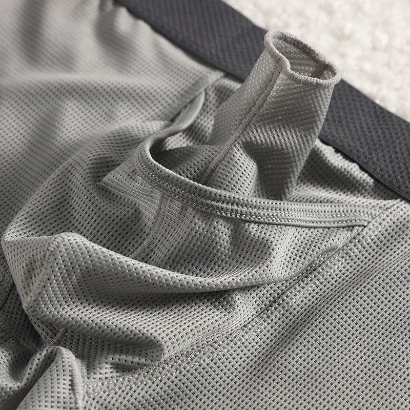 Men's ice silk boxer underwear in breathable mesh fabric showing low waist design