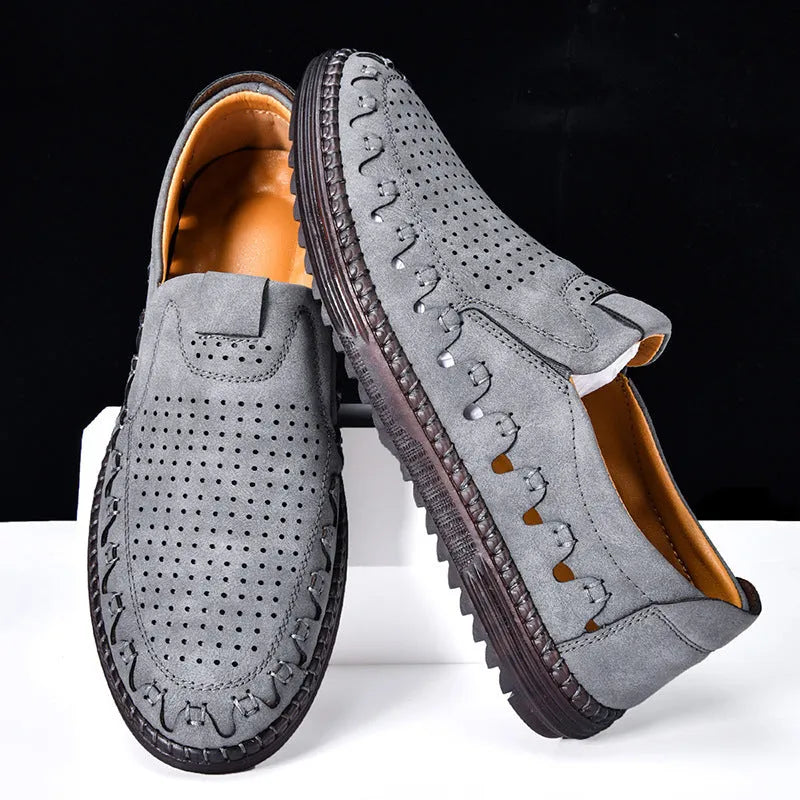 Men's brown slip-on leather shoes with round toe, low-top design, and hollowed-out details on artificial PU upper