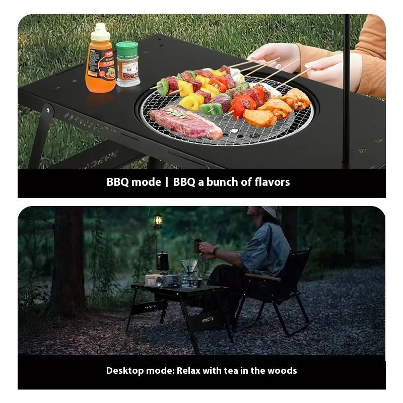 Black folding steel camping table with an integrated barbecue grill set up outdoors.