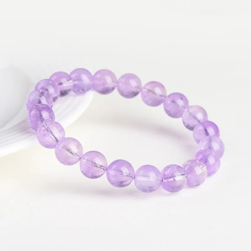 Lavender amethyst geometric bracelet with water ripple design showing nine bead size options from 6-6.8mm to 17-17.8mm diameters