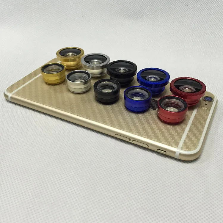 Three-in-one mobile phone lens kit showing fisheye, wide-angle, and macro clip-on attachments on a smartphone.