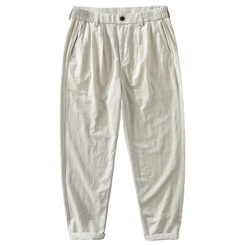 Men's loose straight-leg trousers in a cotton linen blend, shown in a solid colour.