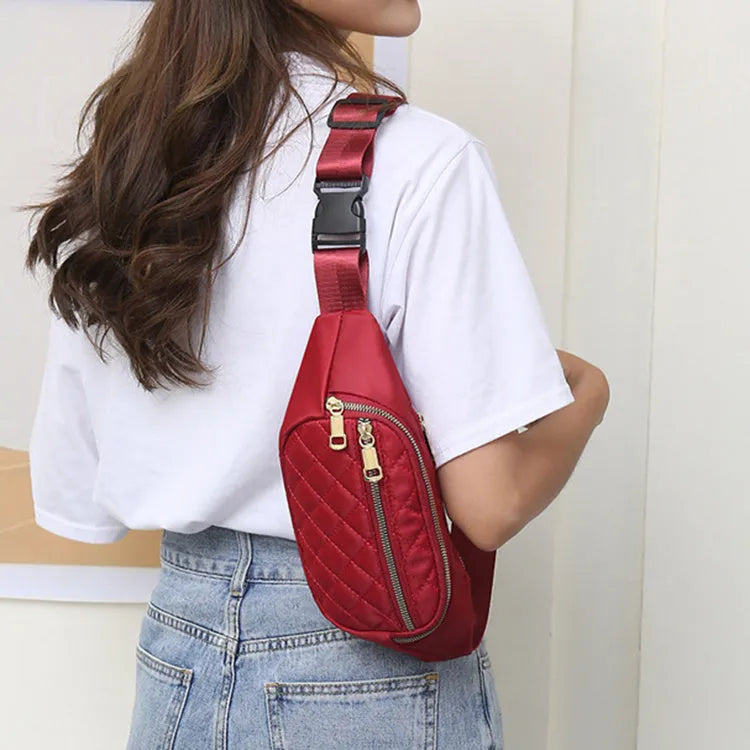 Rhombus nylon fanny pack for women in solid colour with zipper pockets and single soft handle for crossbody or waist wear.