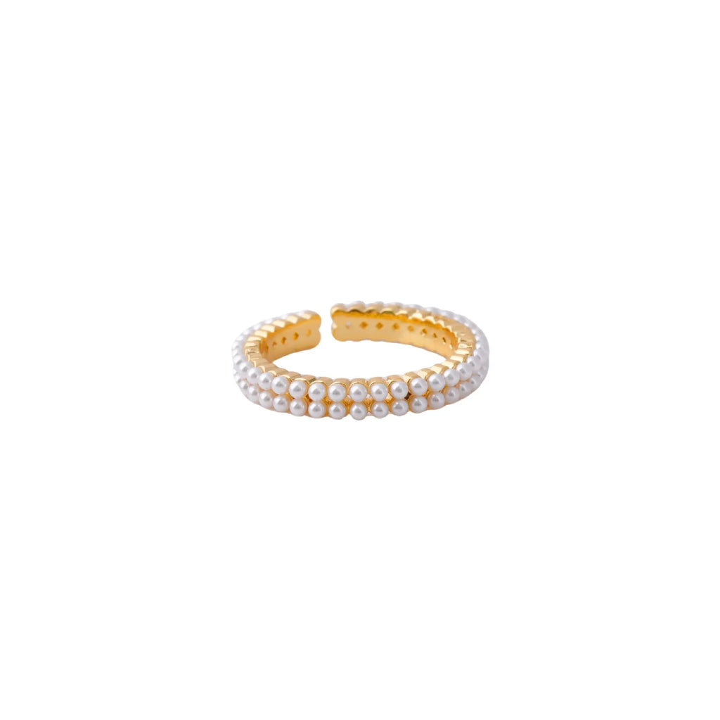 Gold-coloured geometric open-mouth ring with pearl detailing on copper electroplated band