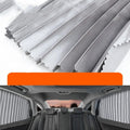 Auto retractable sun curtain in black colour showing flexible cloth material and roller shutter mechanism for car windows