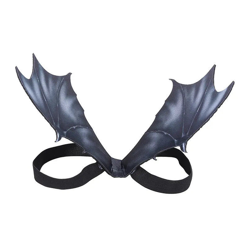 Black cloth bat wings for pets in three sizes: 64cm large, 55cm medium, 40cm small, attached to a dog’s harness