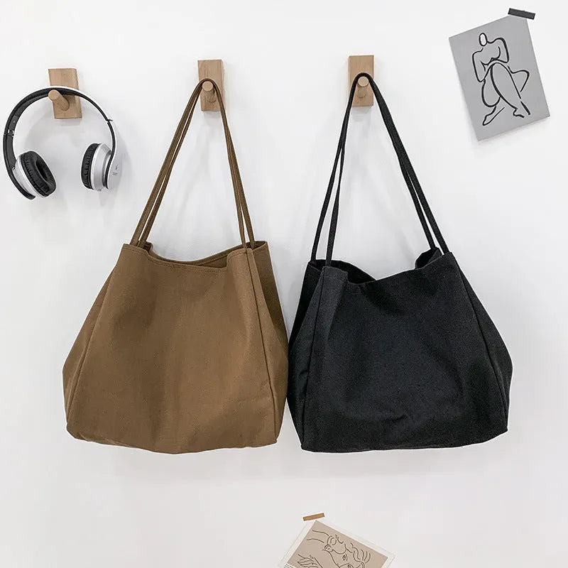 Solid colour women's canvas handbag with double shoulder straps and large capacity design