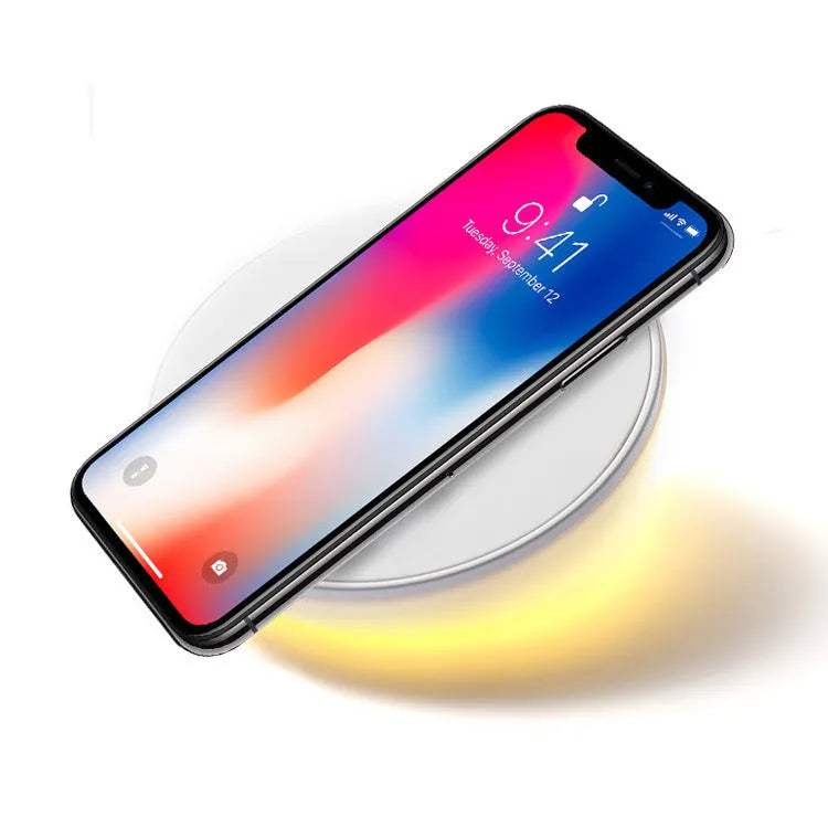 White wireless charger with clock display, 10W fast charging for mobile phones, dimensions 115mm by 24mm by 55mm