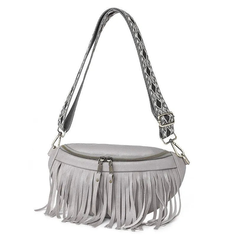 Retro style messenger bag with tassel decoration and pleated design in medium-soft PU material