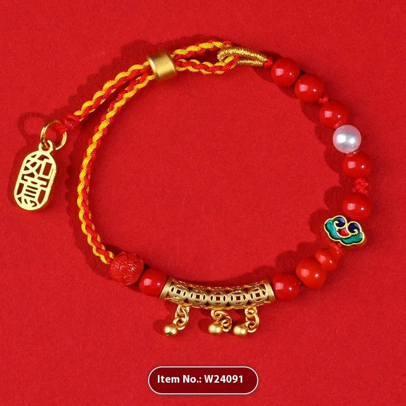 Red rope woven bracelet with round cinnabar charm and small bell for women