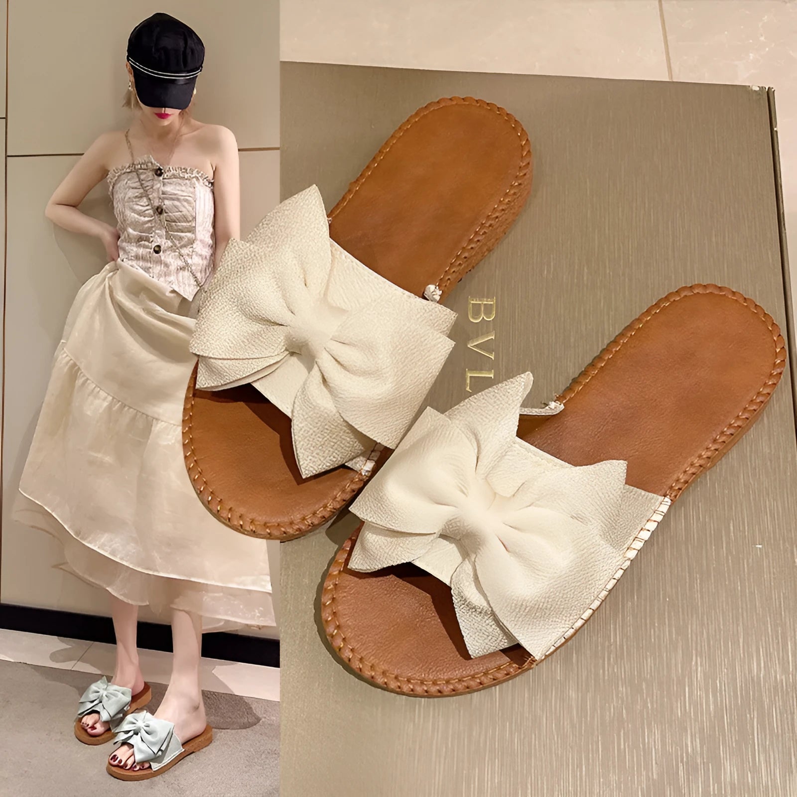 Women's beige suede slip-on sandals with a bow and soft rubber flat sole.