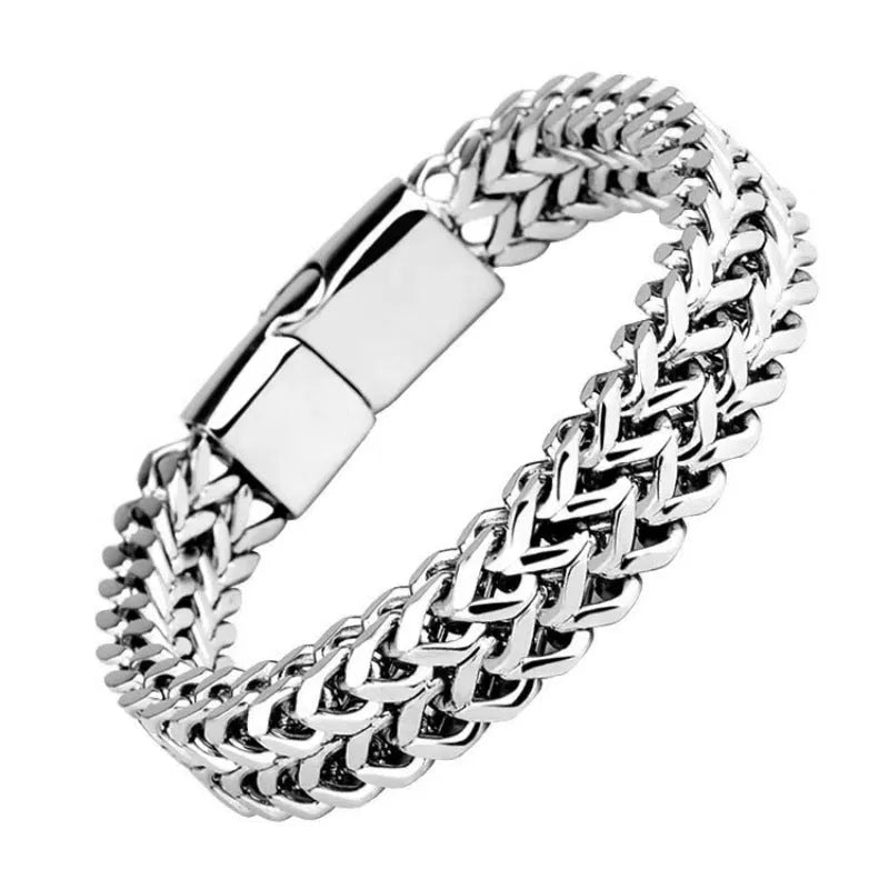 Silver titanium steel men's hip hop bracelet with geometric beads on a wrist.