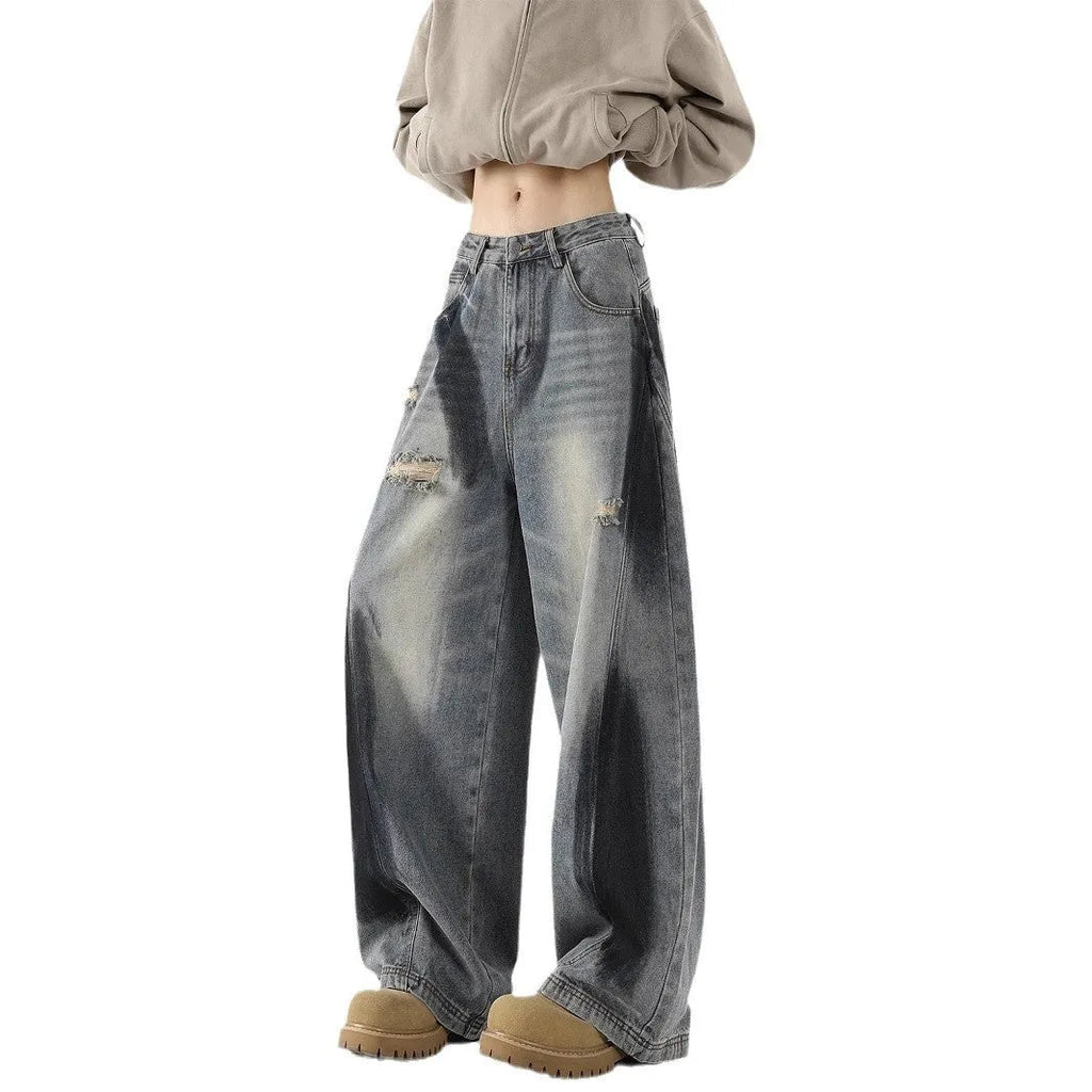 Men's blue loose fit ripped jeans with American-style splash-ink wash and distressed detailing