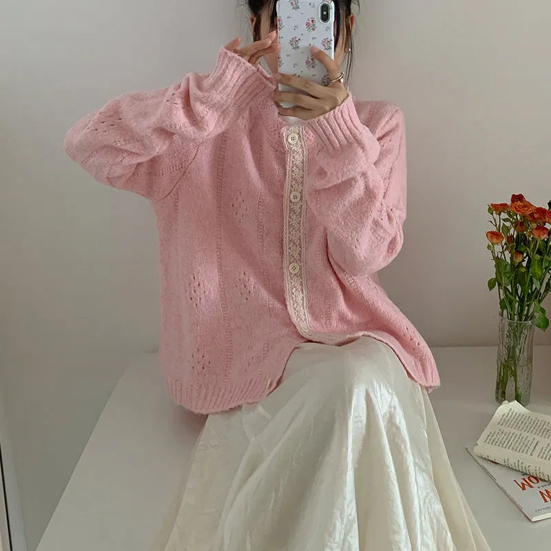 Art retro style Korean knit sweater coat cardigan in a loose free size, shown in apricot colour.
