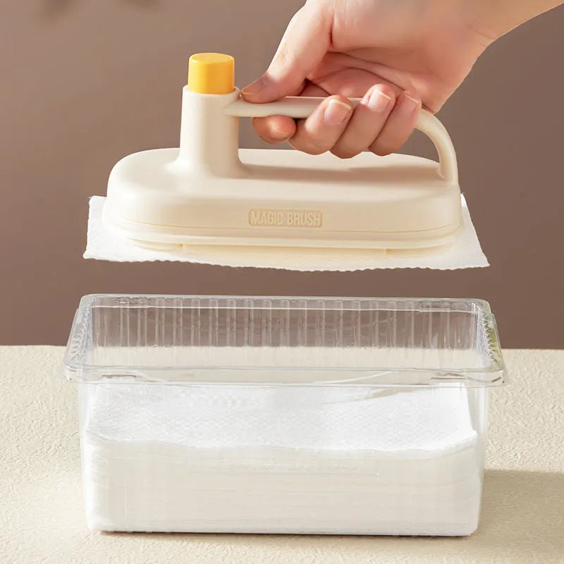 Magic Cleaning Brush with plastic handle and pack of 50 white disposable non-woven fabric rags.
