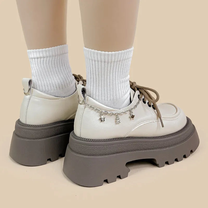 White platform leather shoes with chunky heel and front lace-up, round toe design, shown in XINGX Bear colour