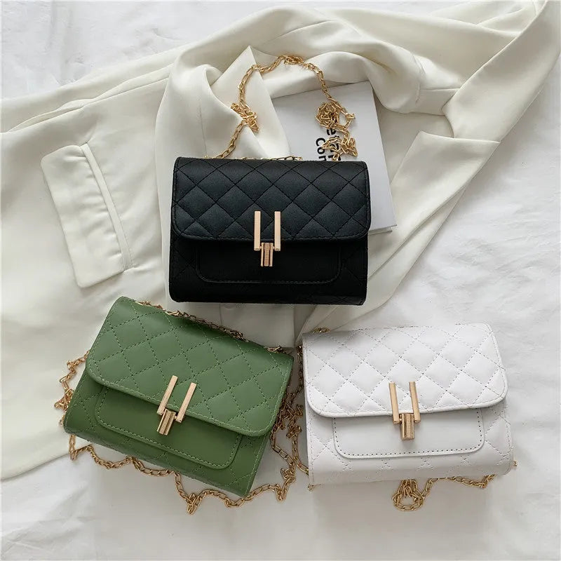 Women's crossbody bag with diamond lattice pattern, adjustable 120cm strap, shown in black colour with dimensions 17.5cm width