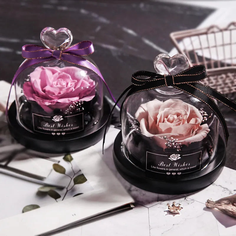 Eternal real rose with LED light inside a 13x13x12cm transparent glass dome, available in multiple colours