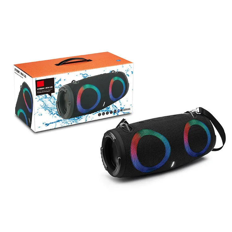 War Drum Bluetooth speaker with RGB lights in black colour, showing strap and button controls for portable outdoor audio