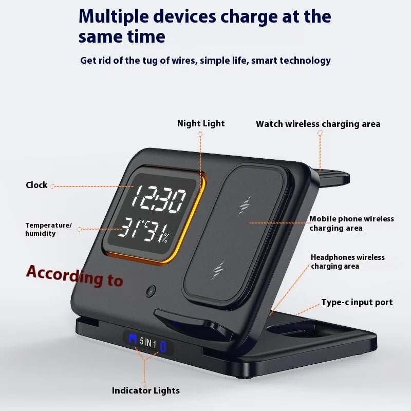 Black and white wireless charging stand with digital clock displaying time and temperature, charging a phone and smartwatch.