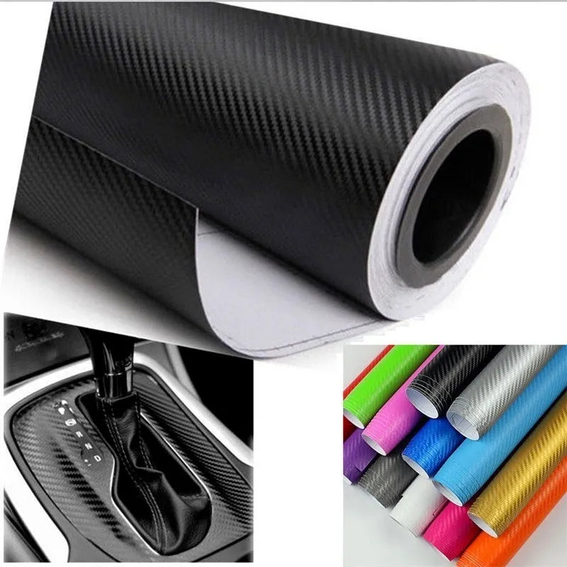 Roll of black carbon fibre textured vinyl sticker for car decoration, showing 3D pattern.