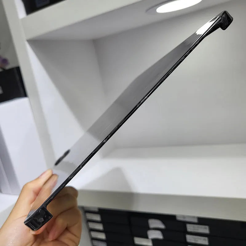 Carbon fibre flat protective cover for iPad Pro 11 showing embossed plaid pattern and precise port cutouts