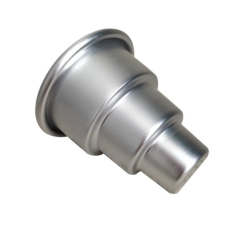 Set of three silver aluminium alloy cake moulds in large, medium, and small sizes.