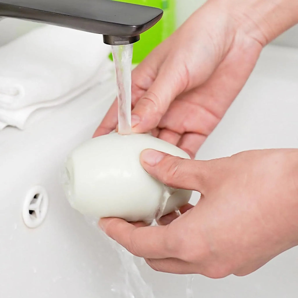 Green washable reusable gel lint roller ball with 4.5cm diameter for pet hair removal from clothes and furniture