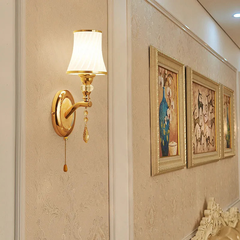European wall lamp with glass shade in single and double head configurations for bedroom lighting